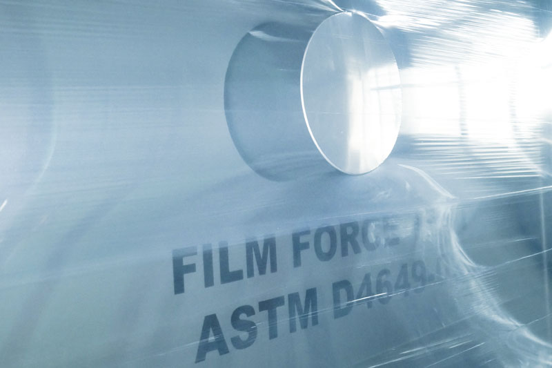 Containment force retention force force to load film memory pallet wrap stretch film hand machine roll real wrapping conditions